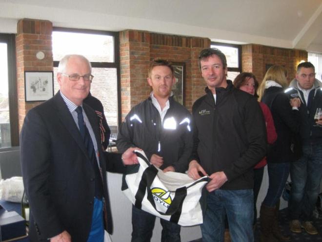 Commodore Chris Mansfield, Neil 'Jaffa' Harrison, Sales Manager for RSrnYC Academy sponsors Doyle Sails, and Allan Higgs, ESF Energy, winners of the J/70 Class in the Academy Frostbite Series © Peta Stuart-Hunt